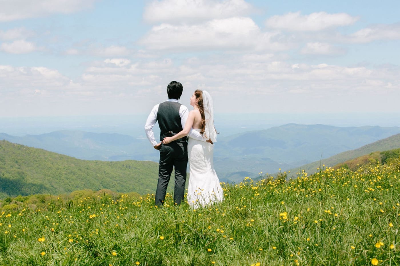 Bride and Groom overlooking the view at Max Patch